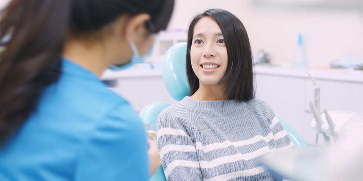 woman visiting the dentist - Thornhill dentists by World Dental